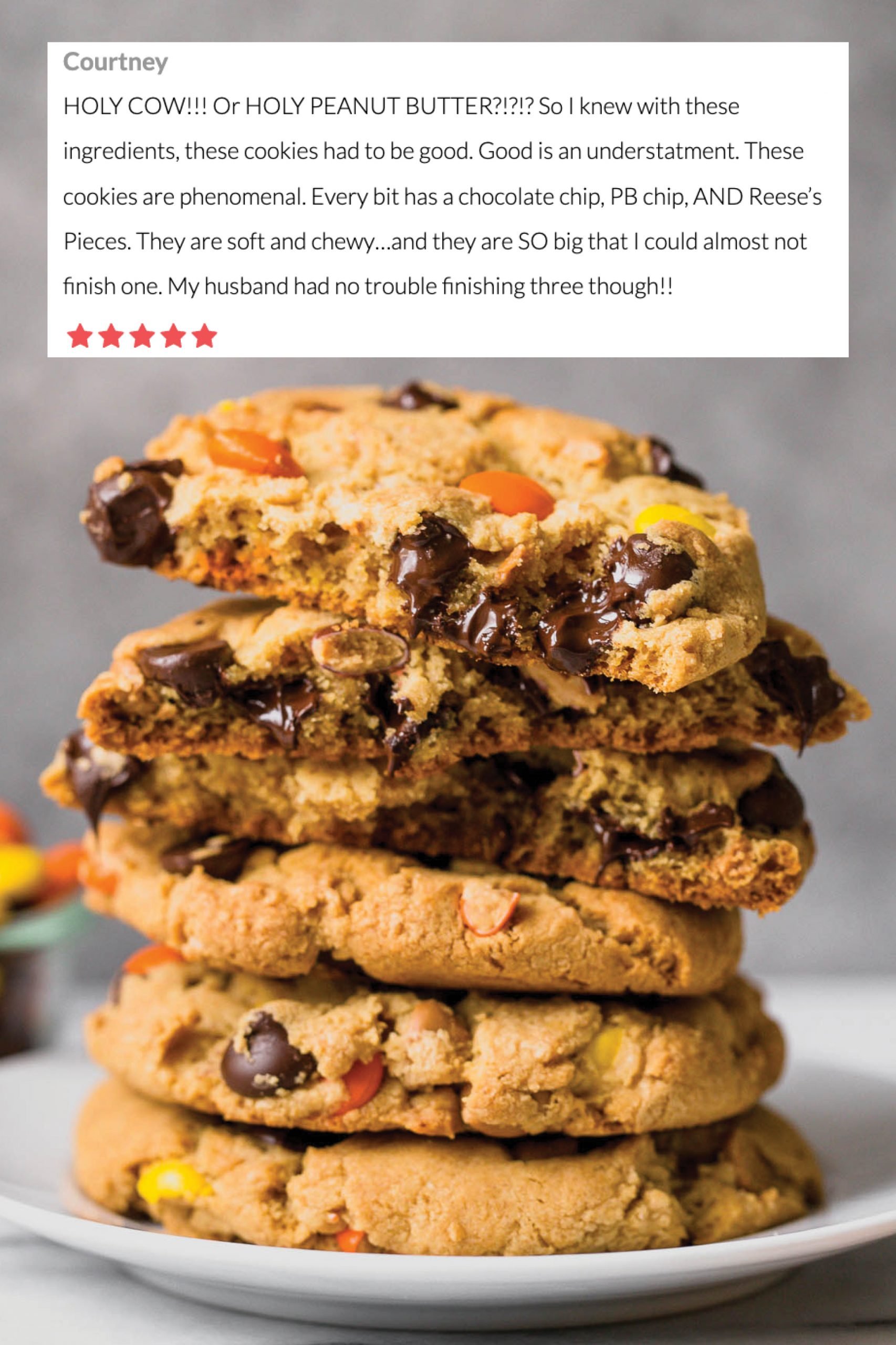 Giant Reese's Pieces Chocolate Chip Cookies stacked on top of each other, on a plate. The ultimate PB easy dessert recipe.