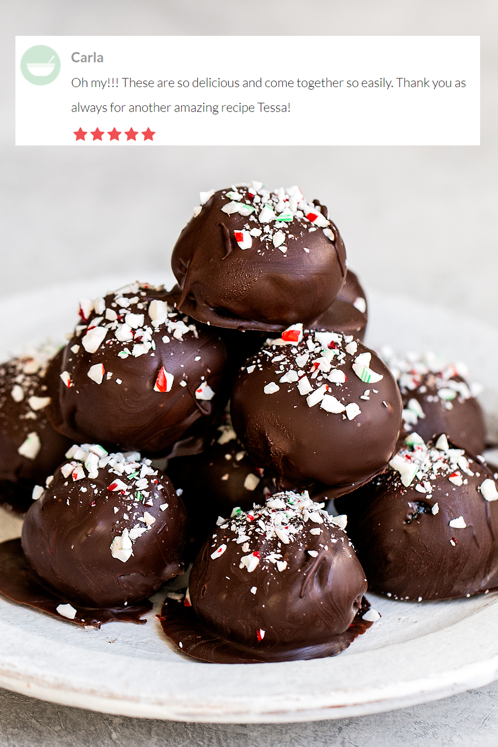 peppermint Oreo truffles stacked on a plate, ready to serve your family and friends for Christmas in July