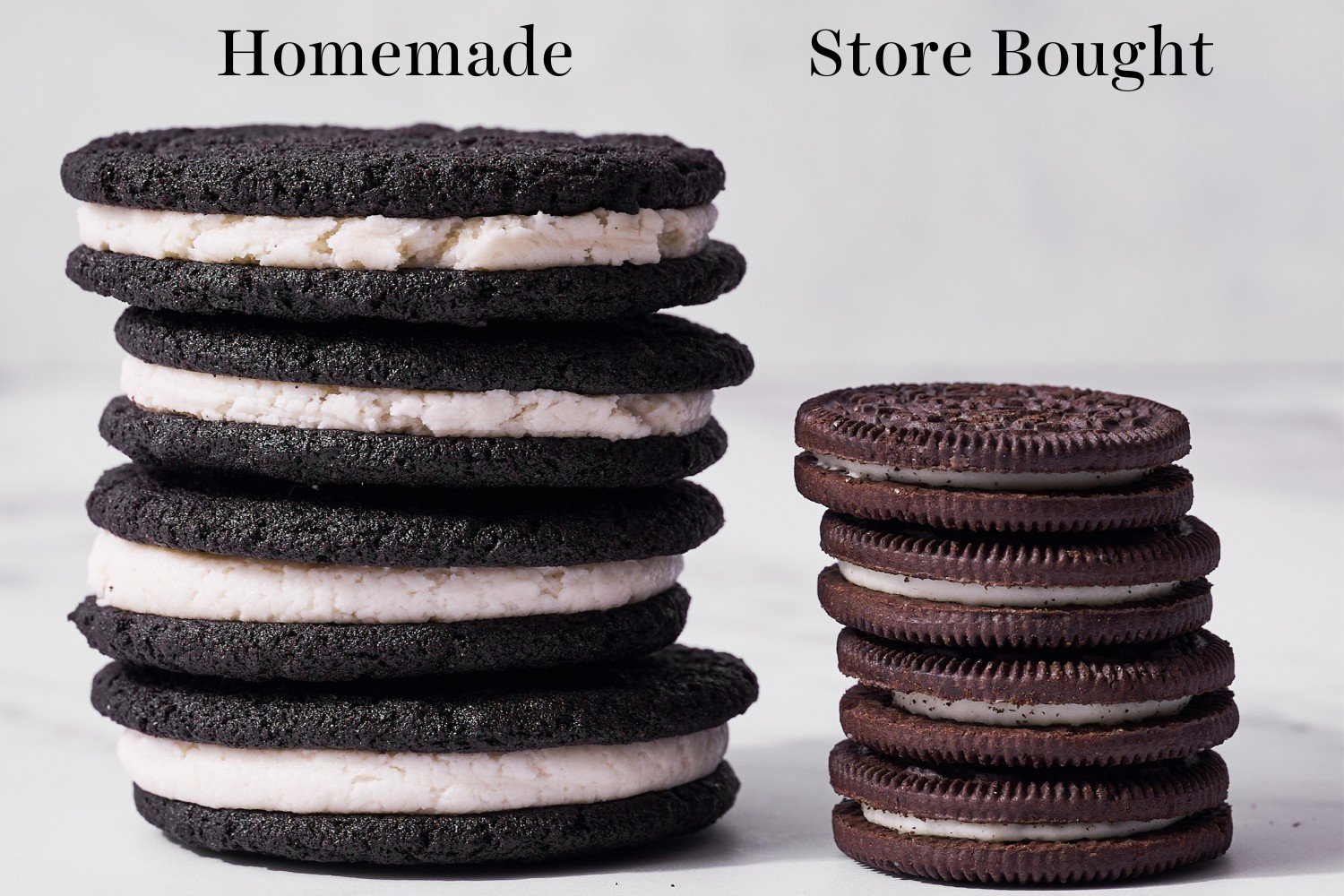a stack of homemade Oreos next to a stack of store bought Oreos, which are much smaller and have less filling.