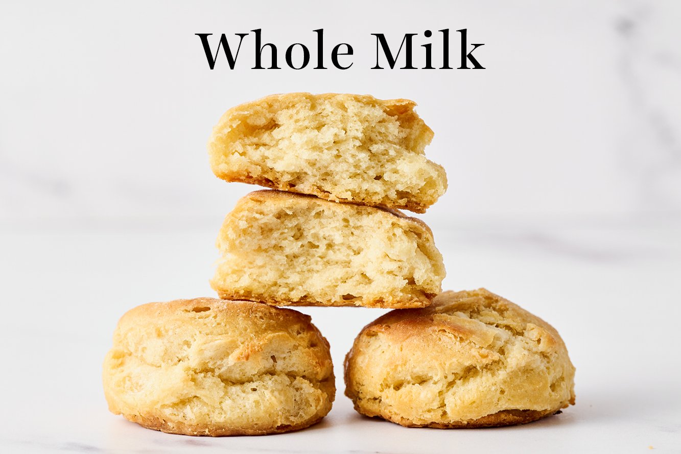 biscuits made with whole milk, with one torn open so you can see inside. These are softer and less flaky