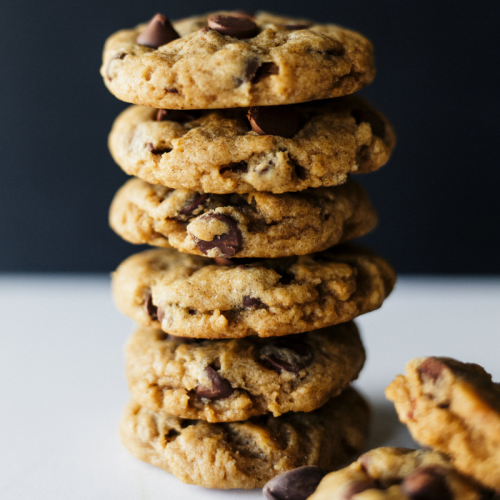 stack of thick, chewy pumpkin chocolate chip cookies