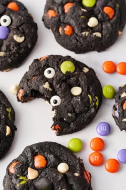 bite taken out of a double chocolate halloween cookie