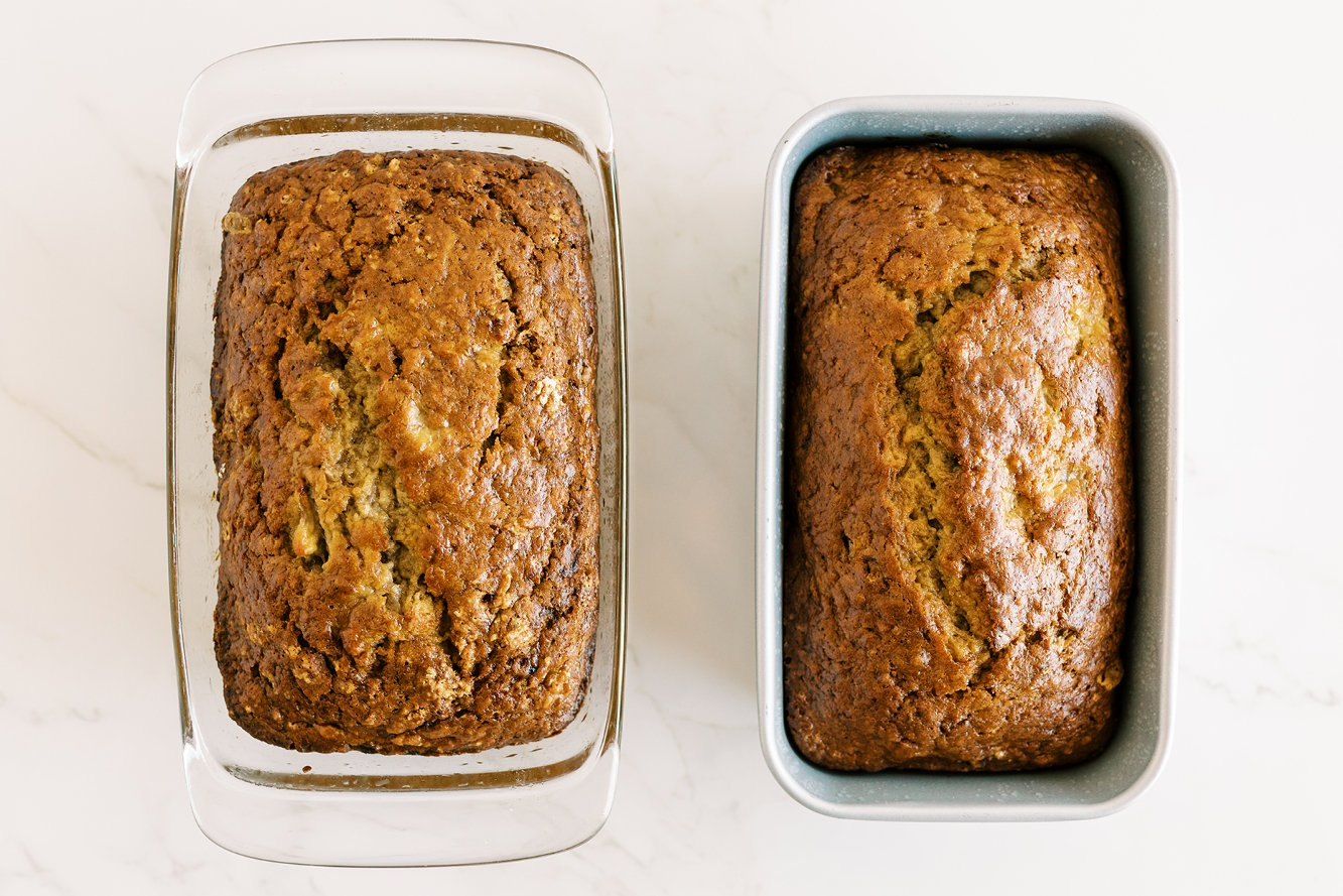 banana bread baked in a glass pan and banana bread baked in a metal pan, side by side