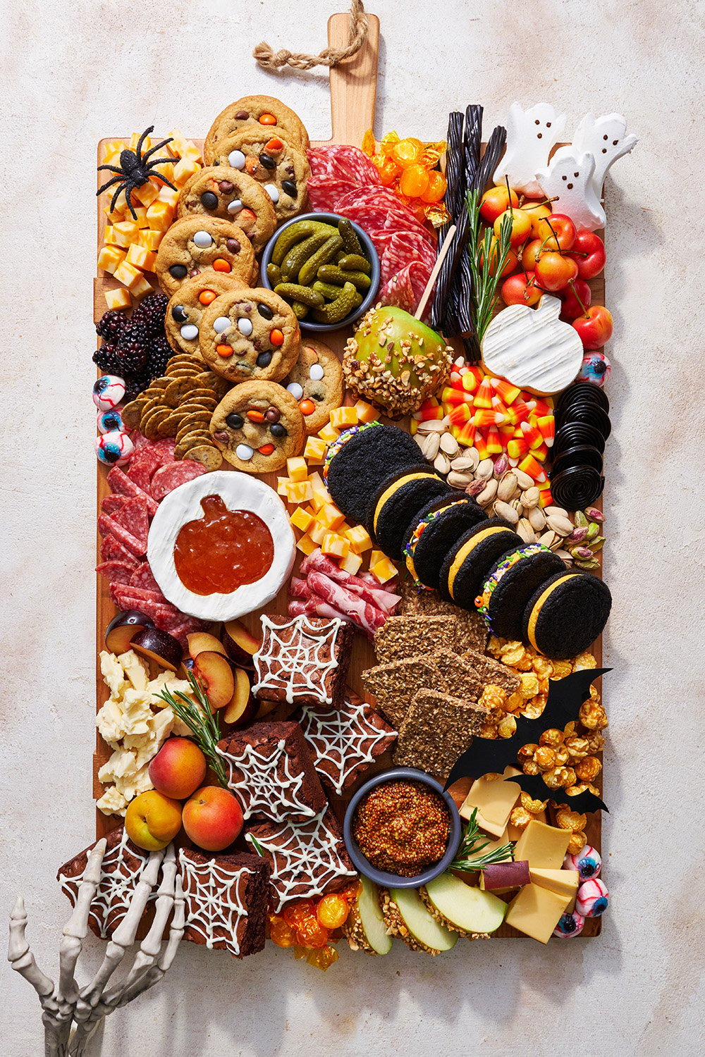 Halloween Charcuterie Board, filled with lots of sweet and savory snacking items