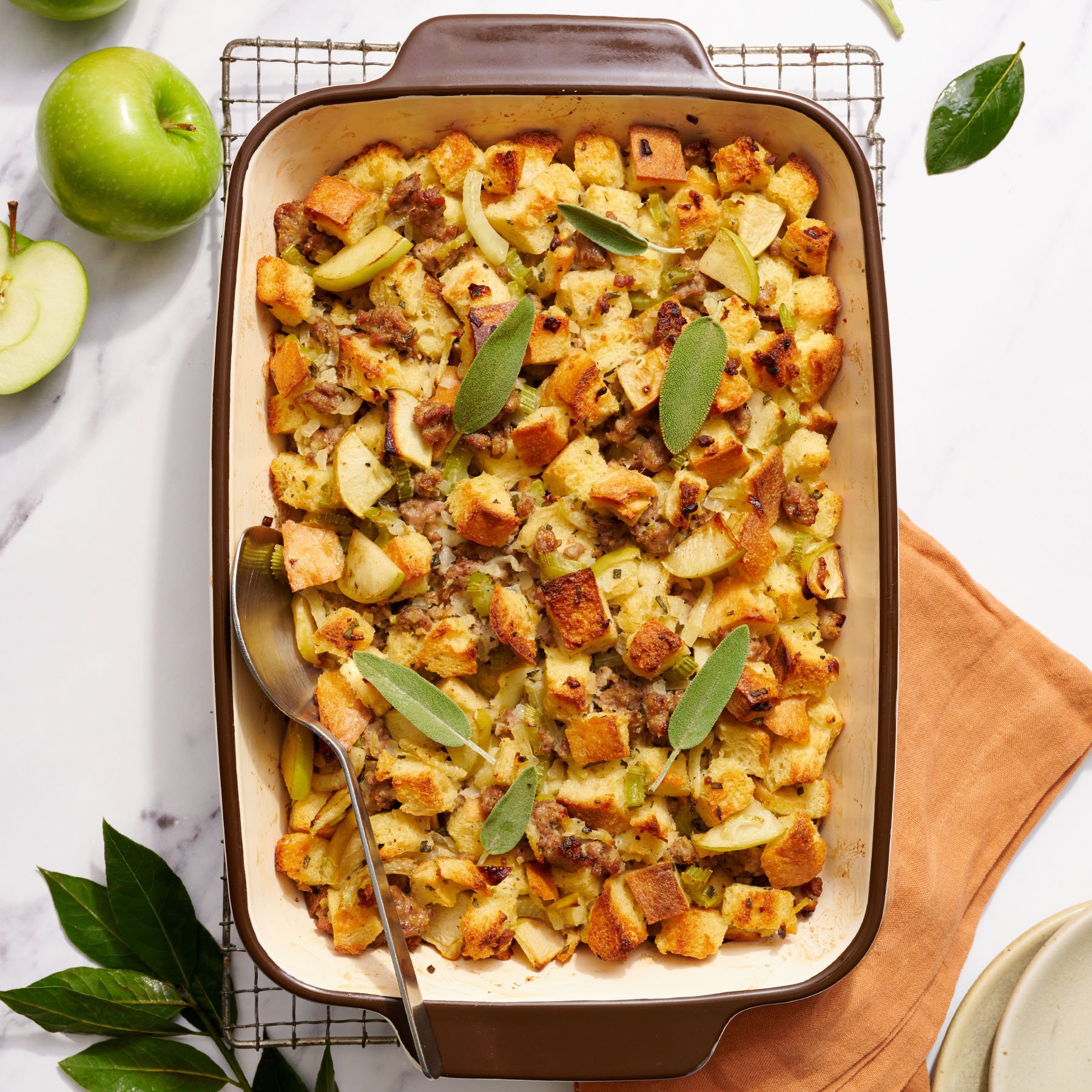 apple and sausage stuffing in a serving dish