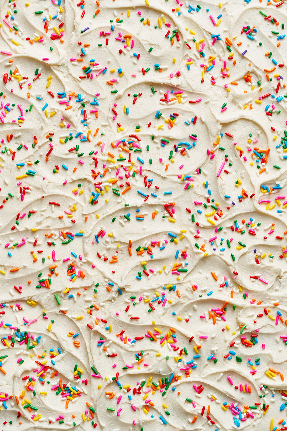 cream cheese frosting swirls with sprinkles
