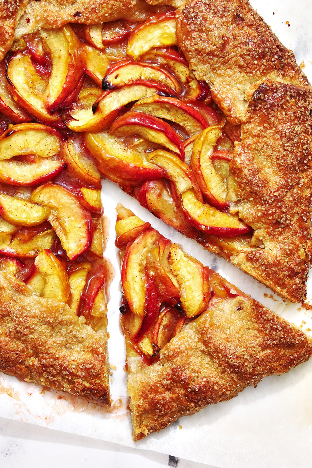 peach galette with a slice removed