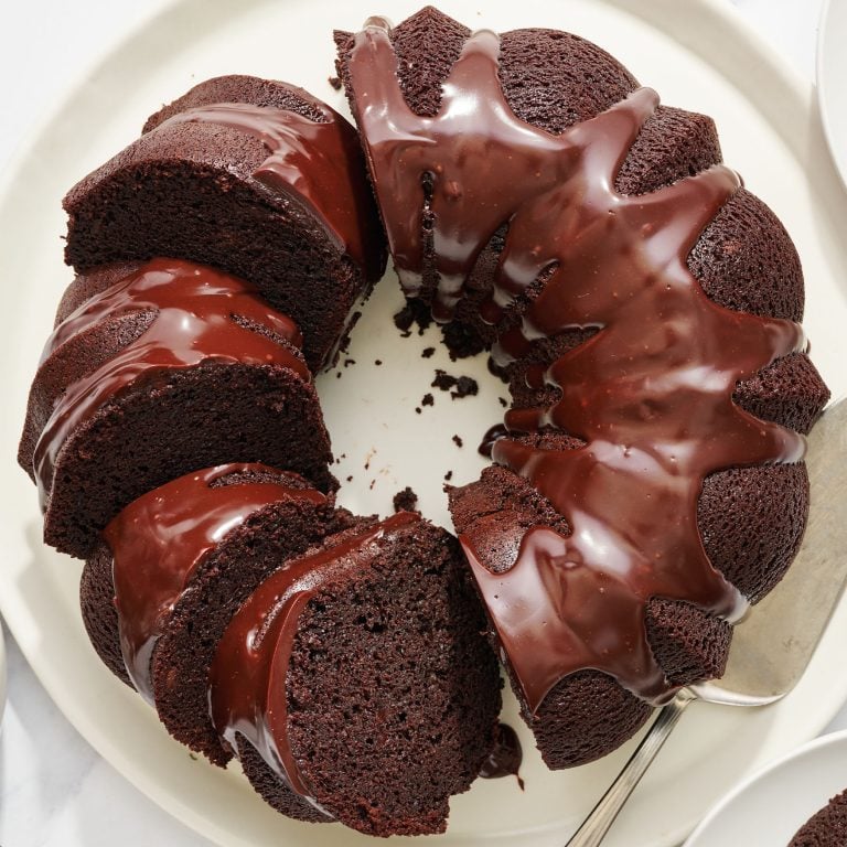 slices of homemade chocolate bundt cake on a serving platter