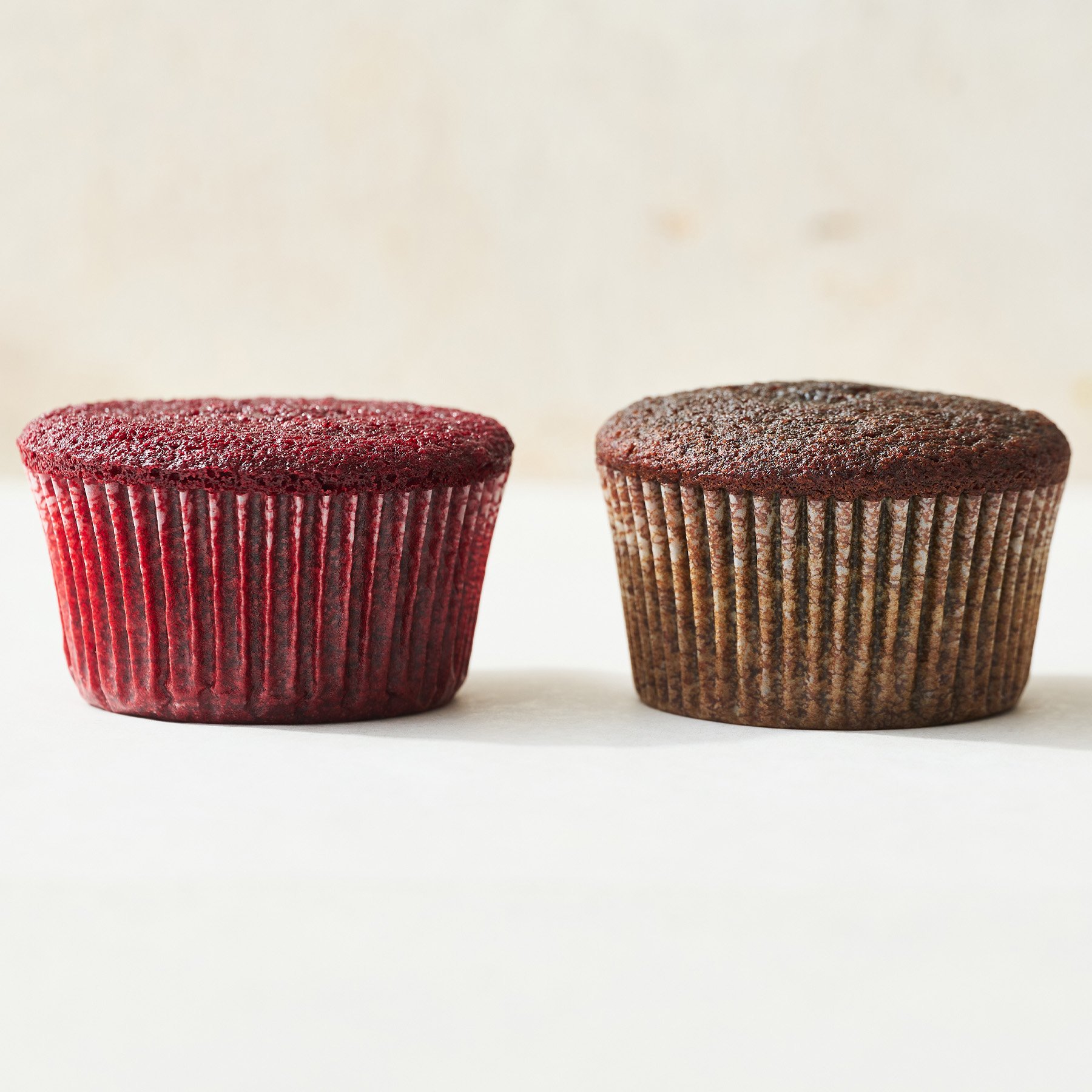 comparison of red velvet cupcakes made with artificial food coloring vs. natural food coloring
