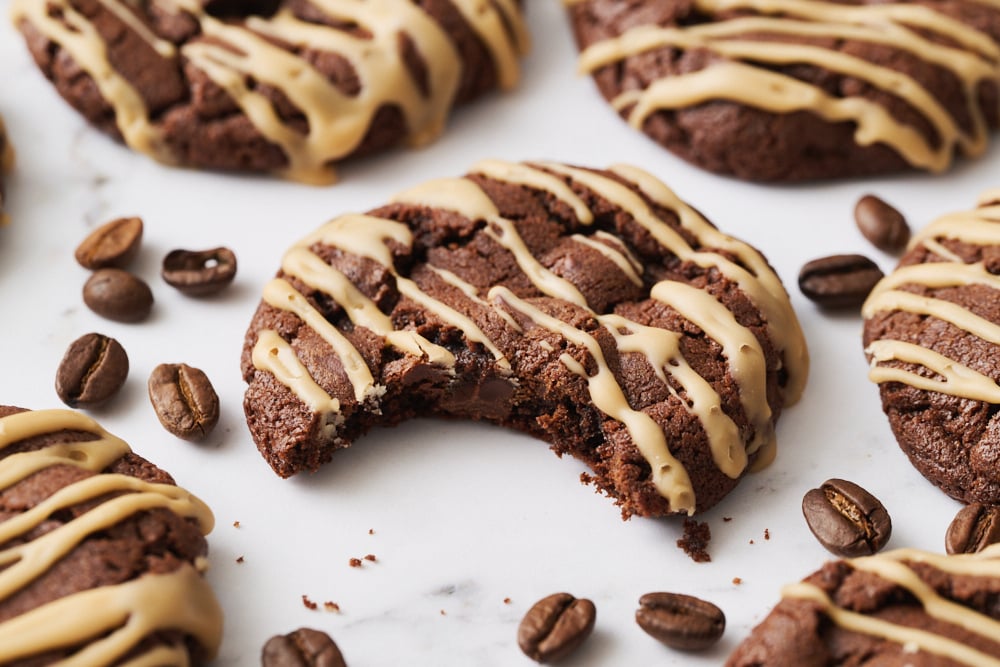 an espresso martini cookie with a bite taken out.