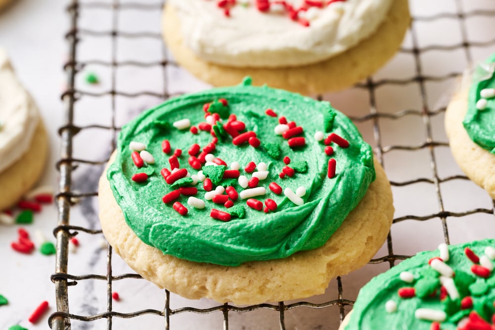 a single Lofthouse cookie with green icing and holiday sprinkles.