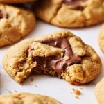 a peanut butter nutella cookie with a bite taken out.