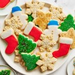 a plate of iced and decorated sugar cookies.