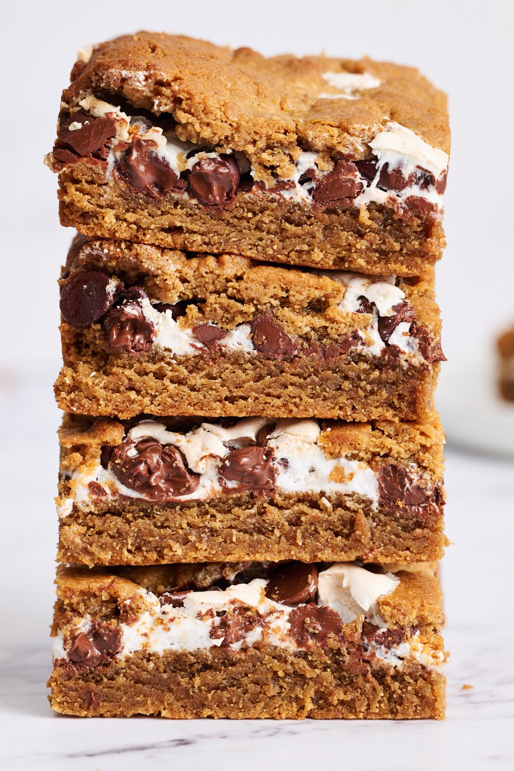 a stack of peanut butter blondie slices.