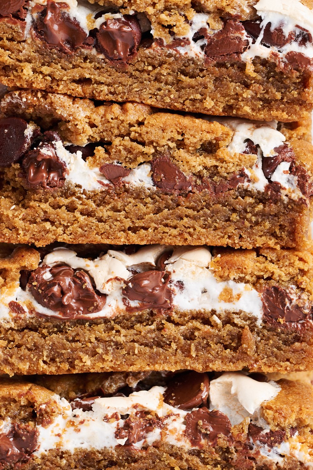 close-up of the peanut butter blondie slices to show to gooey texture.