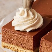 stout-spiked whipped cream being piped on top of a bar.