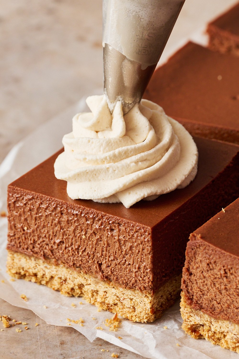 stout-spiked whipped cream being piped on top of a bar.