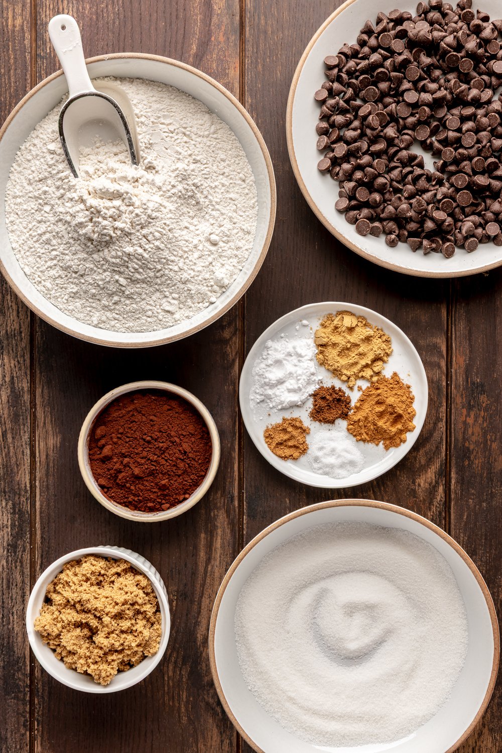 flour, spices, cocoa powder, sugar, and chocolate chips ready to make into dough