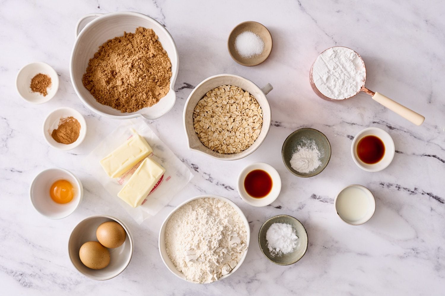 iced oatmeal cookie ingredients portioned and ready for baking
