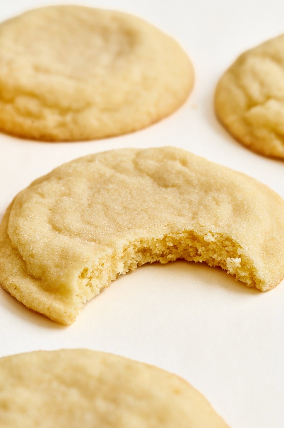 up close view of a cookie with a bite taken out to show soft interior
