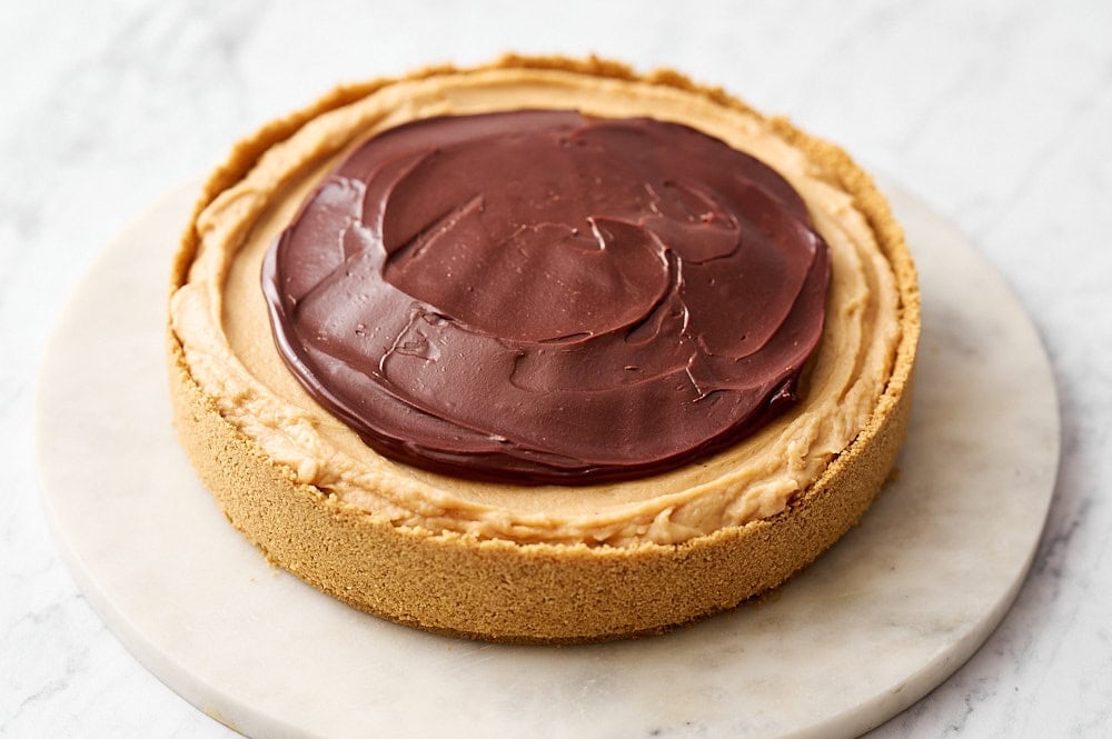 cheesecake on a marble platter, ready to be served