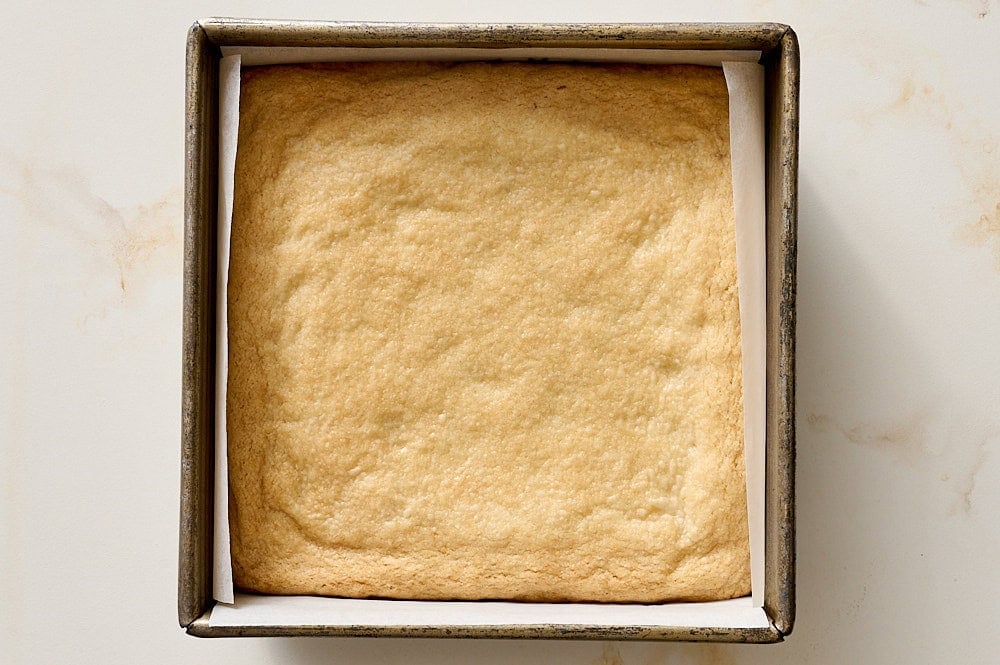 shortbread dough immediately after baking inside pan