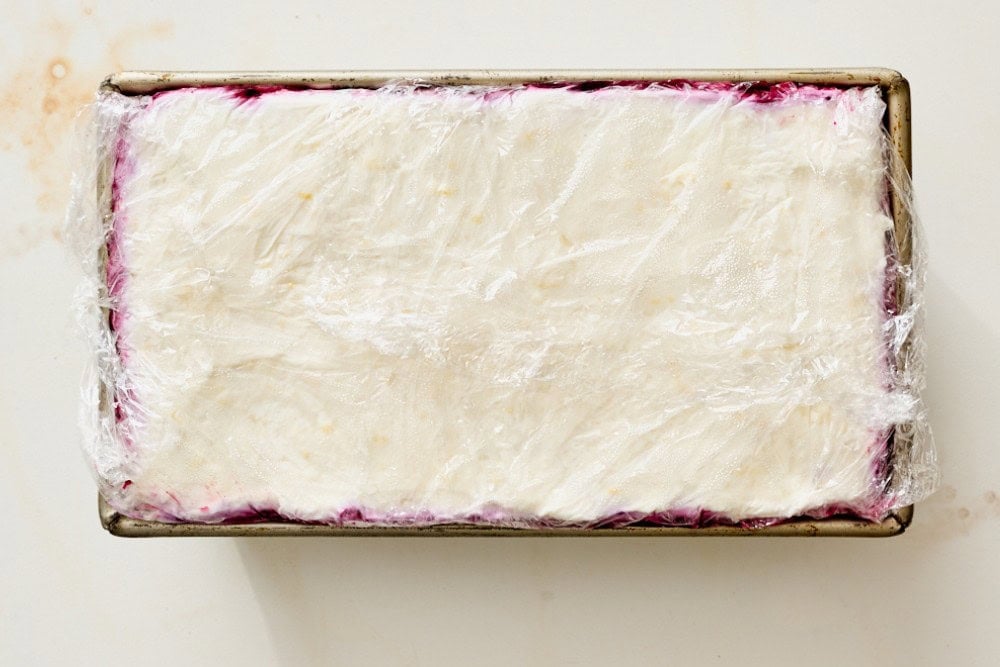 Chilled blueberry lemon icebox cake in a loaf pan before unmolding