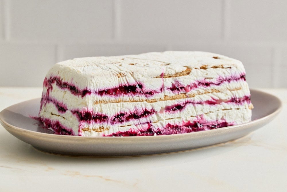 Blueberry lemon icebox cake removed from a loaf pan onto a serving platter