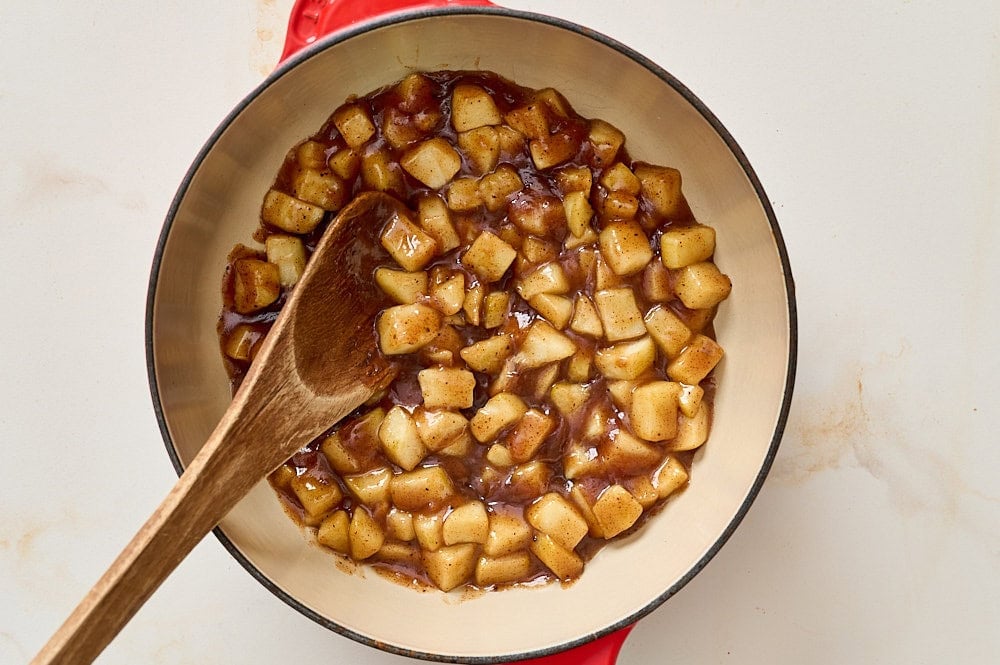 overhead view of apple pie filling inside a skillet