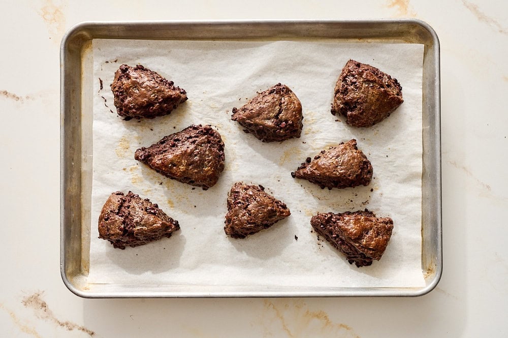 overhead view of freshly baked mocha scones on baking tray