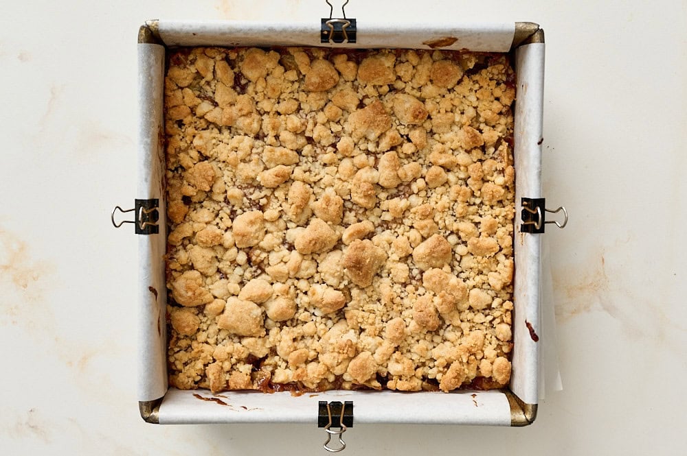 overhead view of freshly baked apple pie bars in baking pan