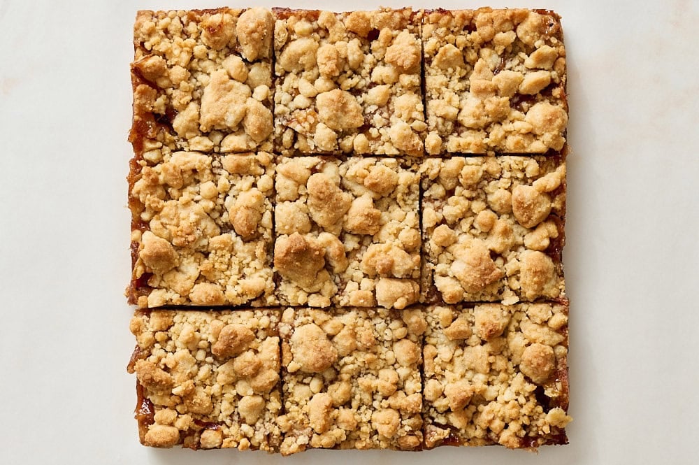 overhead view of apple pie bars sliced into 9 equal squares