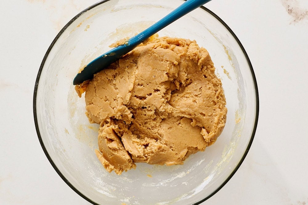 overhead view of peanut butter cookie dough before adding mix-ins to show thick texture